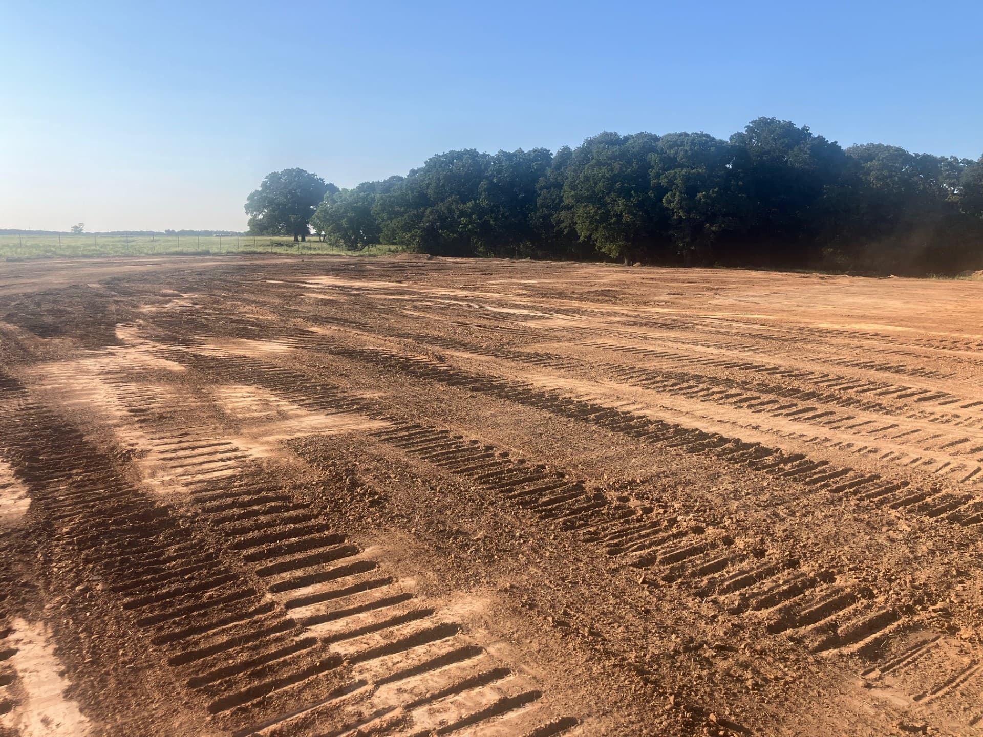 Freshly prepared land with grading marks