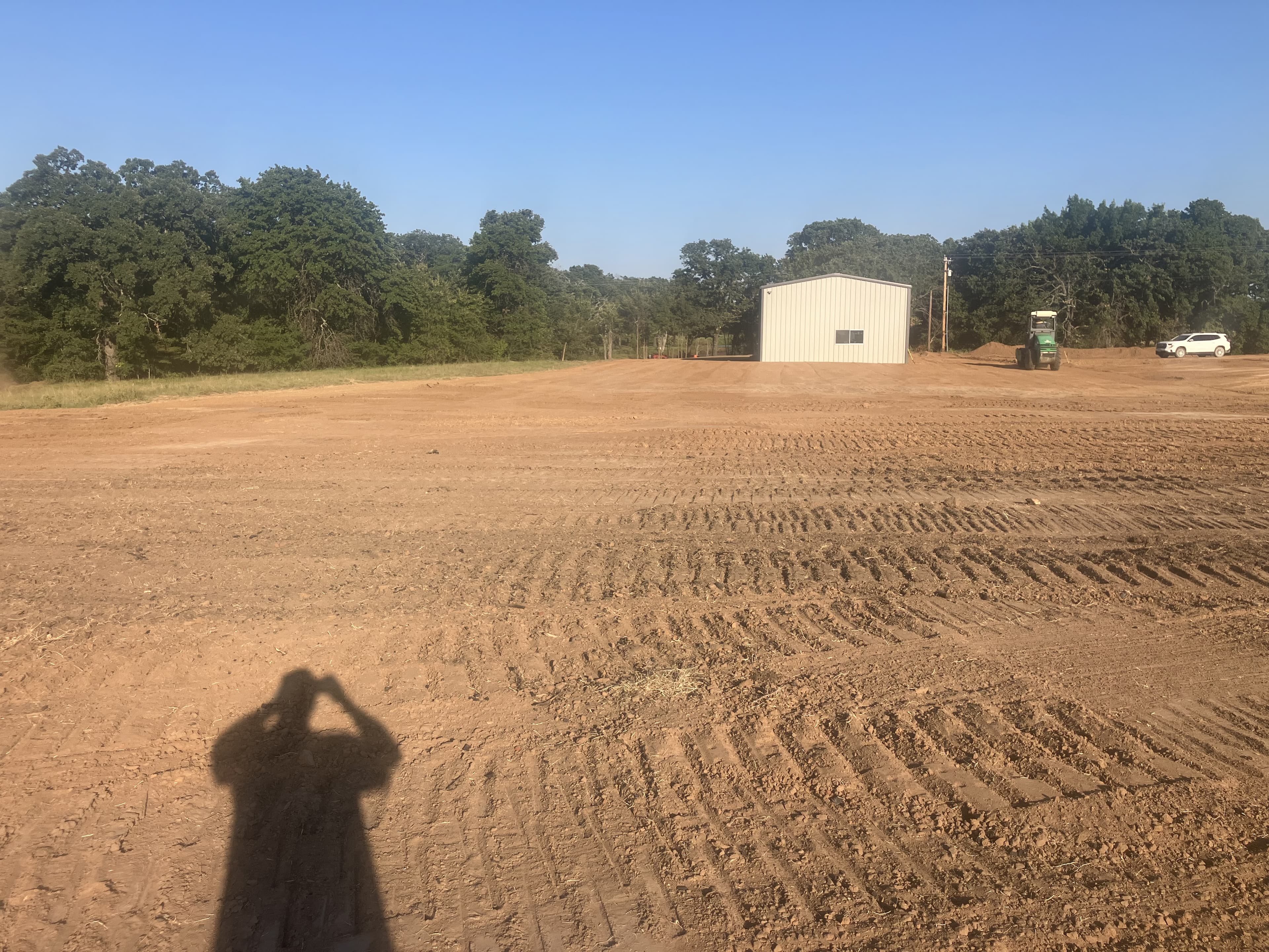 Wide graded site ready for the next construction phase